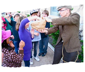 Dressed as a historical character, Kristen explains Winnipeg's history to school children